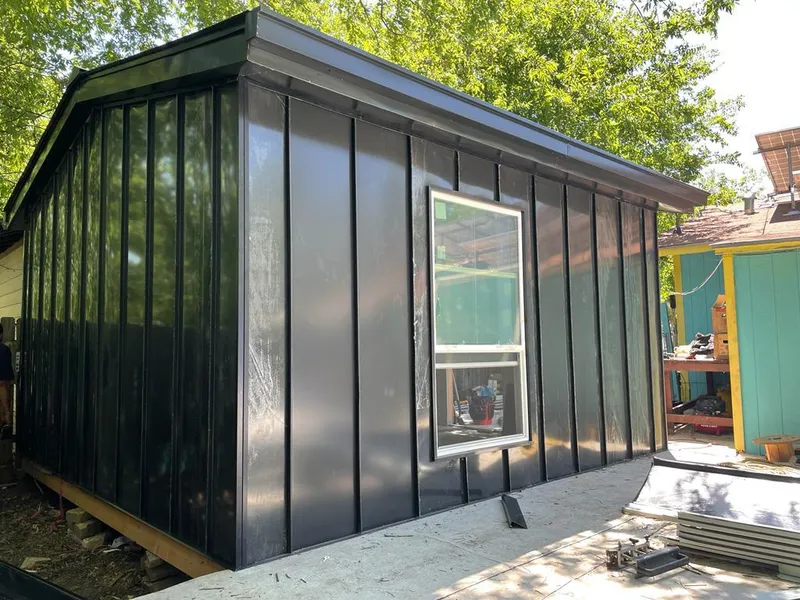 Black standing seam metal wall panels for Roof Inspection in Camp Springs