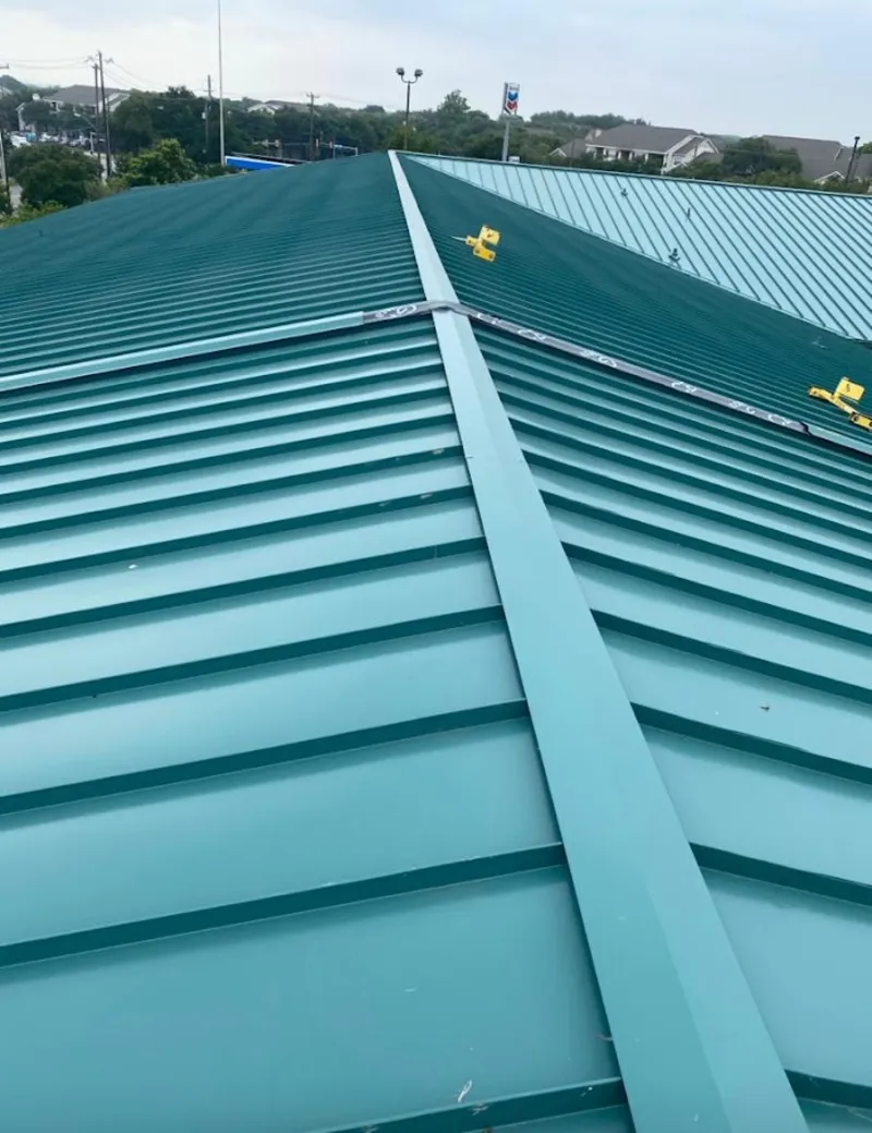 Green commercial metal roof ridge and valley for Metal Roof Repair in Camp Springs